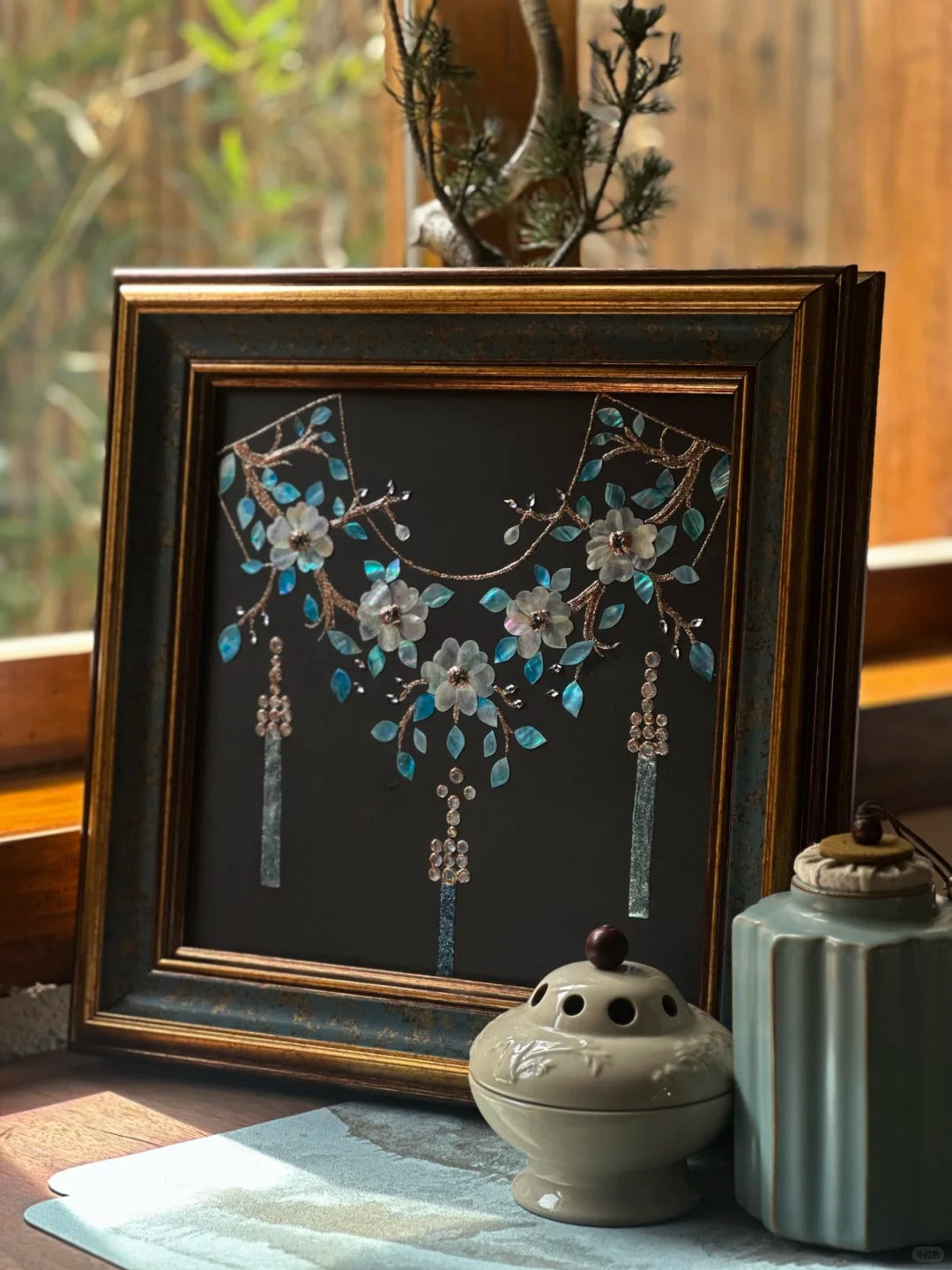Close-up of Dunhuang style shell inlay craft, iridescent mother of pearl cloud pattern, luxury oriental interior decor detail.