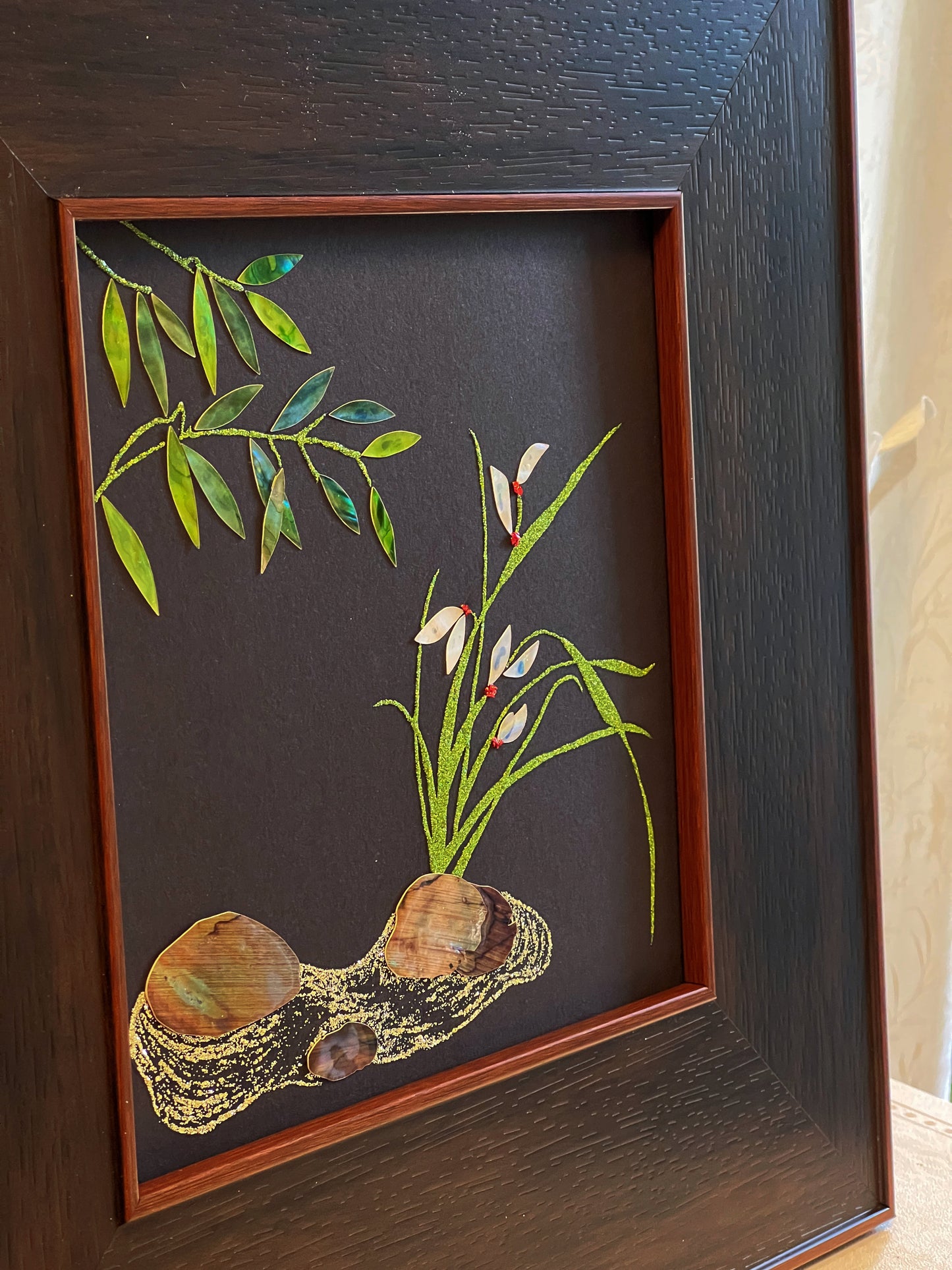 Original Raden shell art Lan Zhu Shuang Qing by Showing Studio in a 35x35cm walnut frame, showing deep green abalone bamboo leaves, ivory mother of pearl orchids and textured tiger shell rocks.