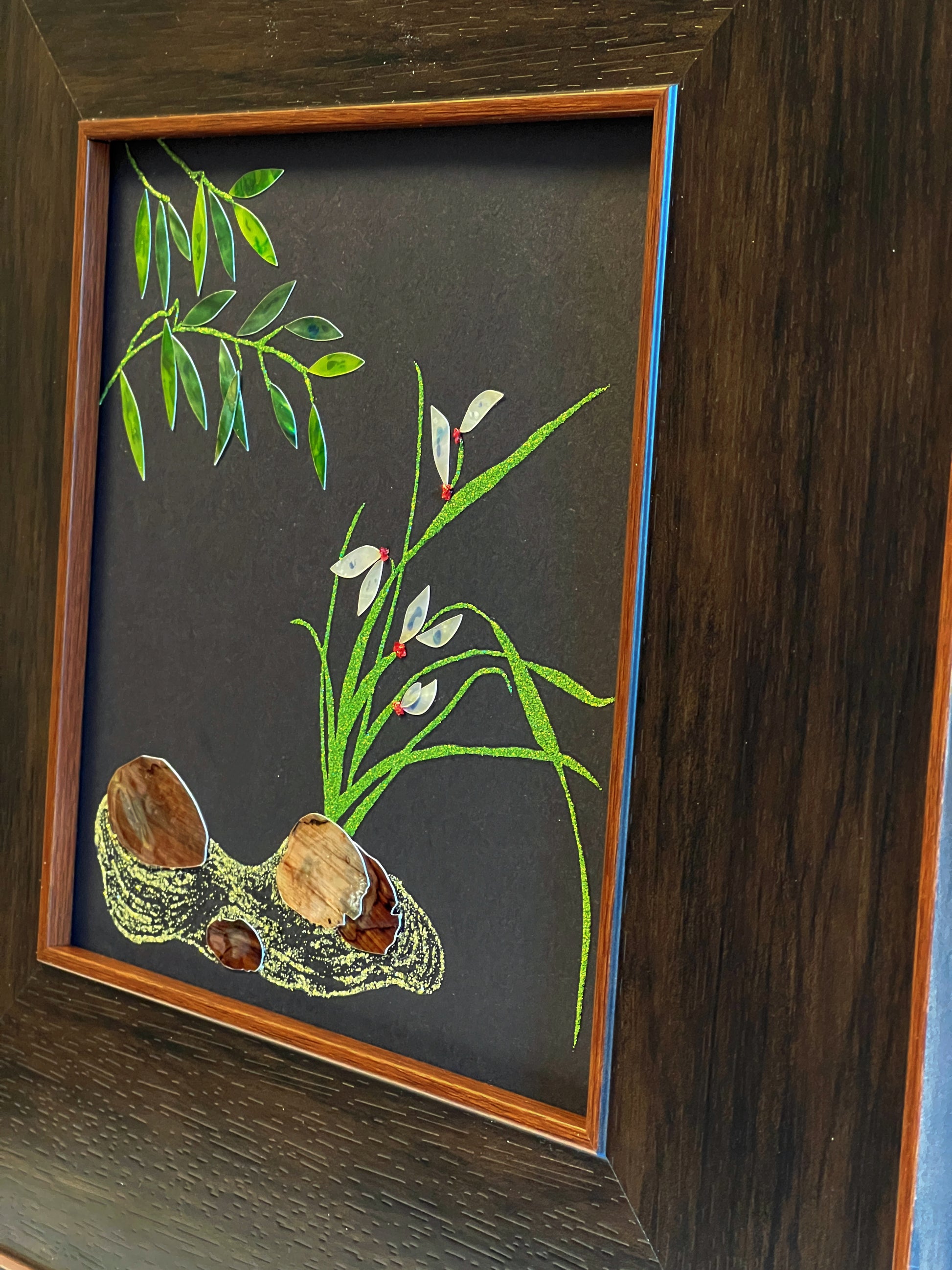 Original Raden shell art Lan Zhu Shuang Qing by Showing Studio in a 35x35cm walnut frame, showing deep green abalone bamboo leaves, ivory mother of pearl orchids and textured tiger shell rocks.