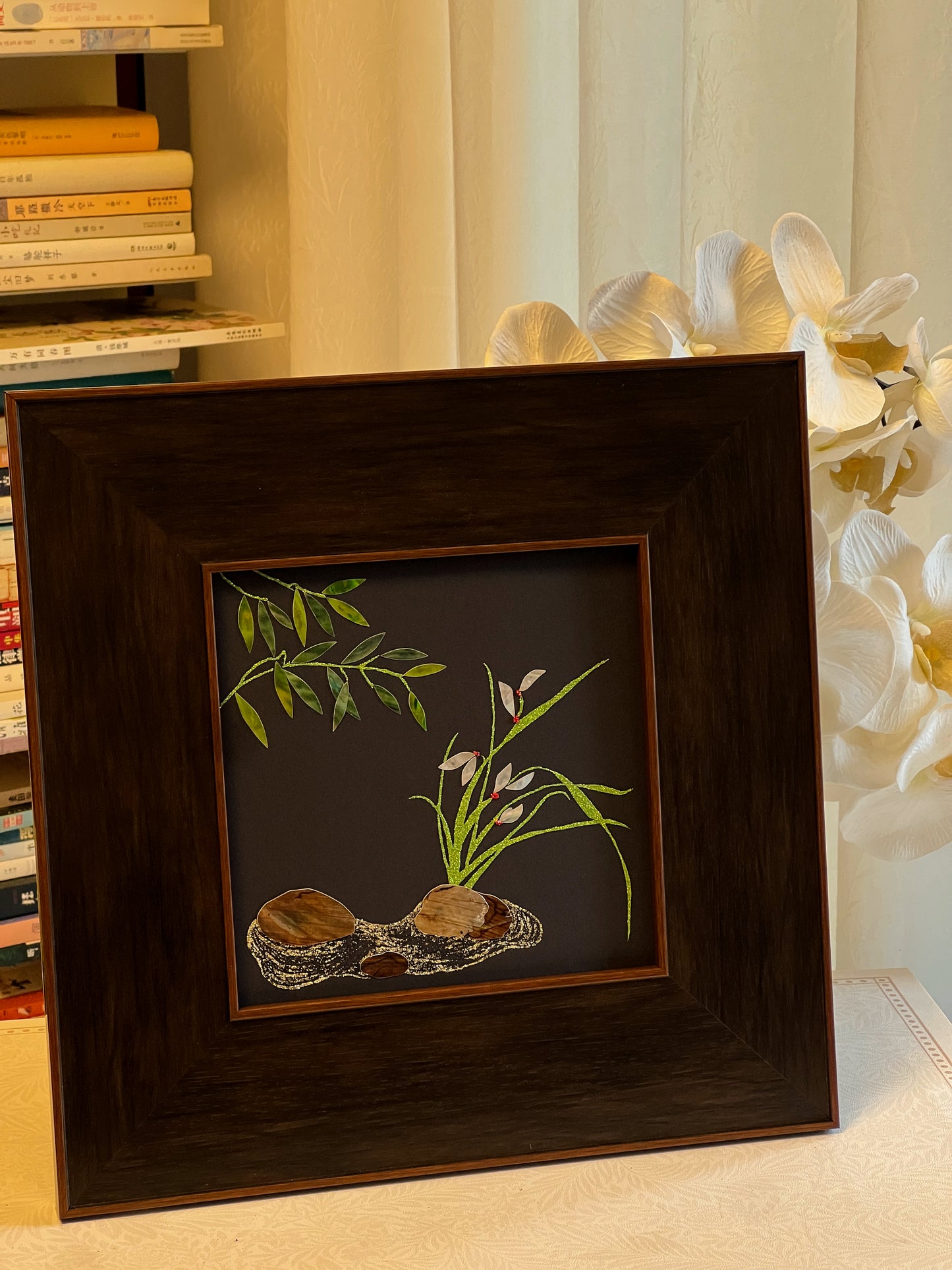 Original Raden shell art Lan Zhu Shuang Qing by Showing Studio in a 35x35cm walnut frame, showing deep green abalone bamboo leaves, ivory mother of pearl orchids and textured tiger shell rocks.