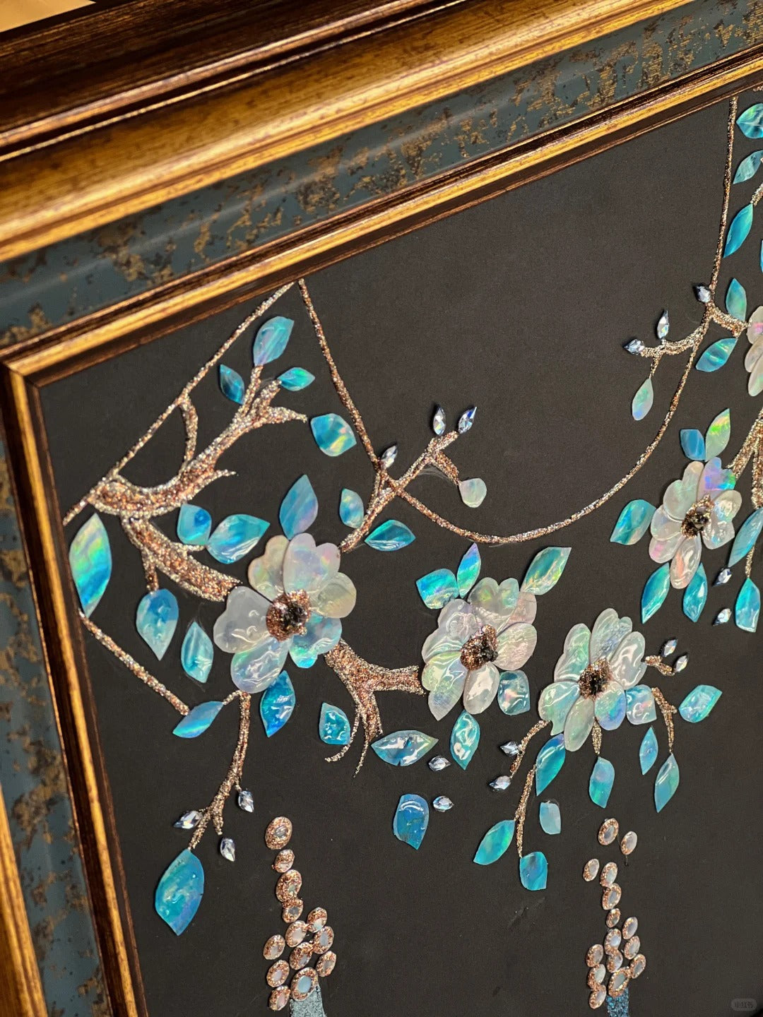 Close-up of Dunhuang style shell inlay craft, iridescent mother of pearl cloud pattern, luxury oriental interior decor detail.