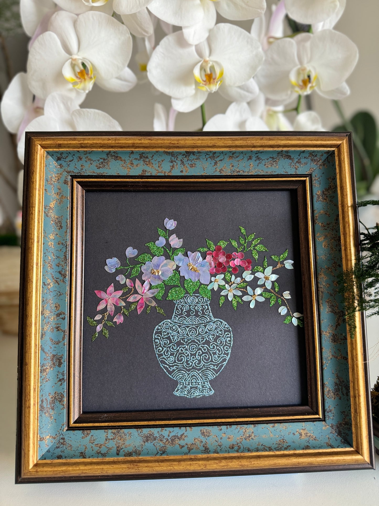 Handcrafted mother-of-pearl inlay artwork "Ping Hua Qing Gong" featuring an elegant vase filled with blooming flowers on a black silk background, housed in a premium 30x30cm rustic frame.