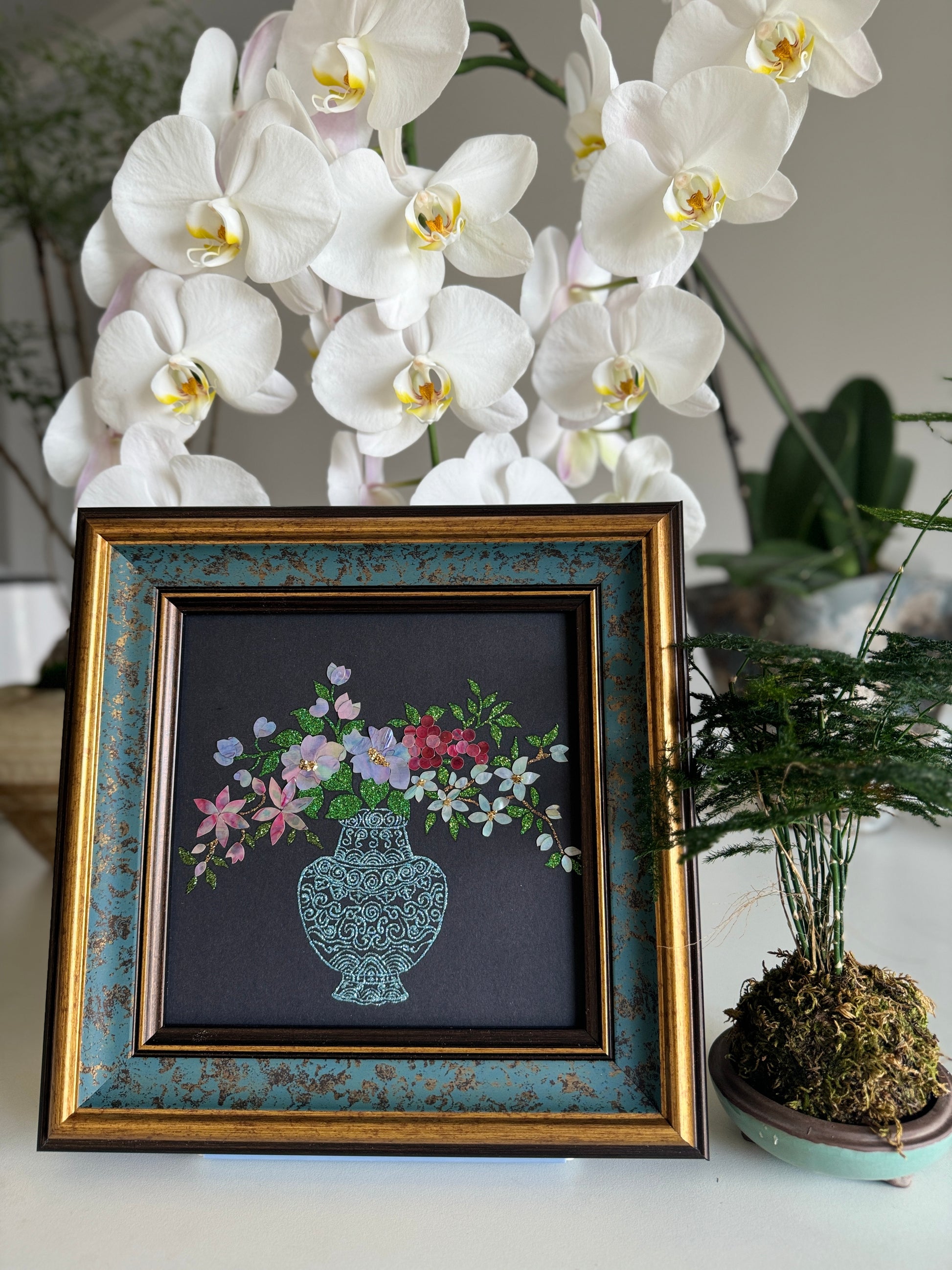 Luxury Zen home decor layout displaying the "Vase of Serenity" traditional Chinese shell artwork on a tabletop, perfect for living room aesthetics or executive office styling