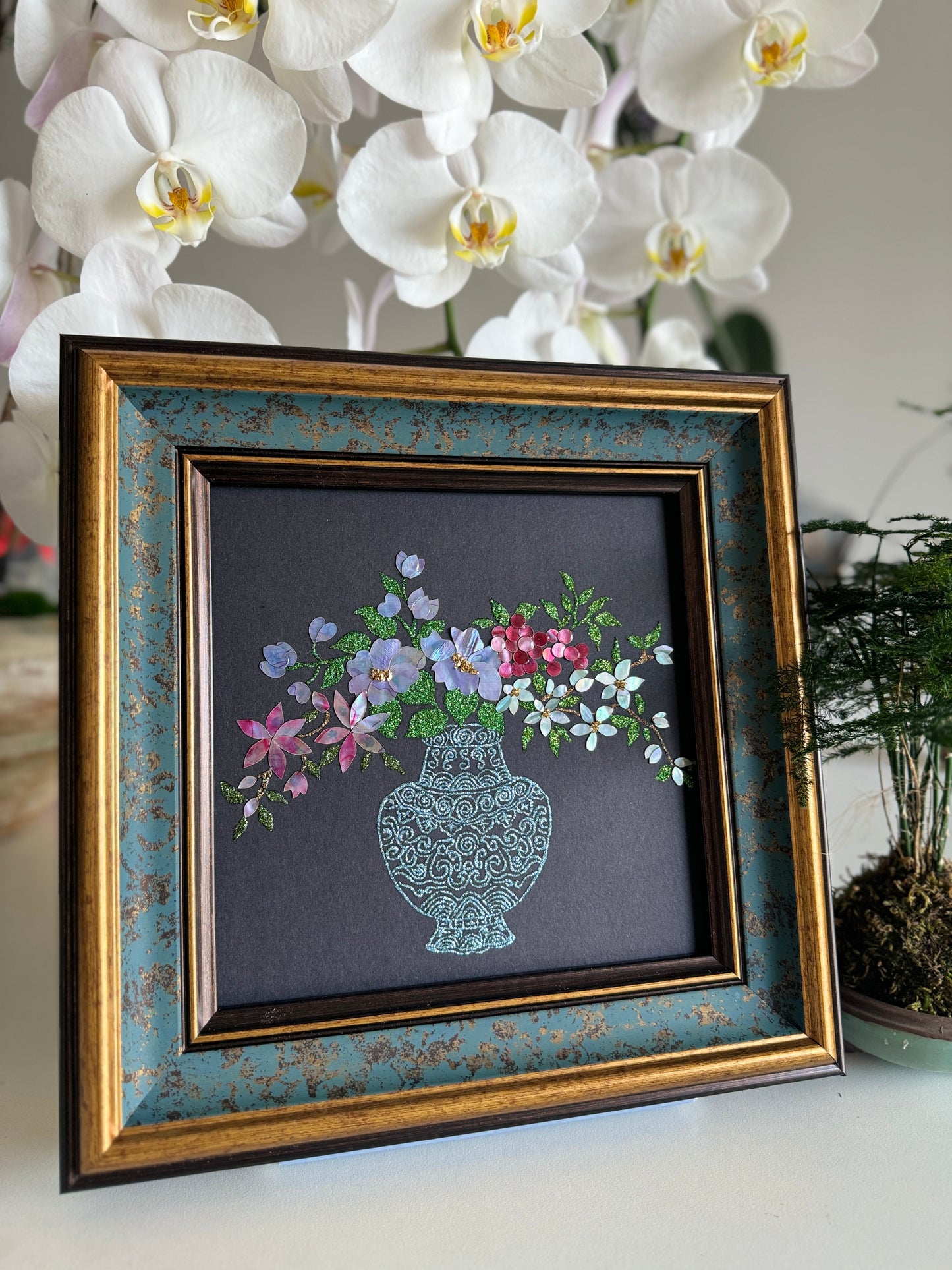 Luxury Zen home decor layout displaying the "Vase of Serenity" traditional Chinese shell artwork on a tabletop, perfect for living room aesthetics or executive office styling