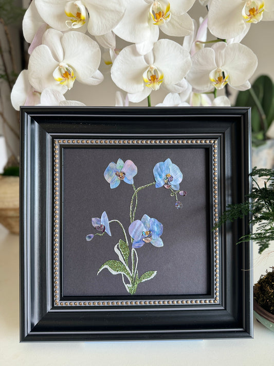 Original abstract Raden shell art titled The Azure Rhythm by Showing Studio in a 29x29cm dark walnut frame, showcasing shimmering green and blue abalone inlay waves on a black background.