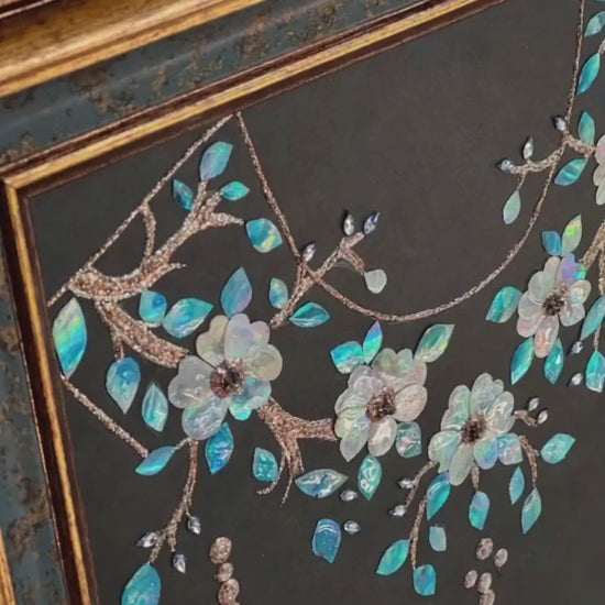 Close-up of Dunhuang style shell inlay craft, iridescent mother of pearl cloud pattern, luxury oriental interior decor detail.